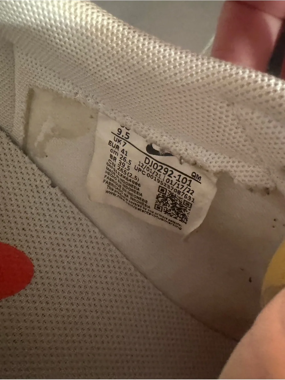 Nike Men’s White Sneakers with Black Swoosh